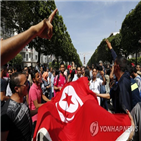 튀니지,시위,대규모,상승,무역적자