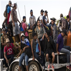 캐러밴,멕시코,이민자,망명,이동,현재