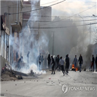 튀니지,언론인,시위,아랍,분신,경찰,촉구