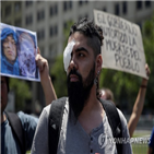 칠레,경찰,시위,고무탄