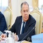 러시아,구금,석방,미국인