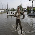 홍수,쓰레기,우크라이나,카호우카