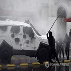 칠레,경찰,장관,대통령,쿠데타,시위대,이날