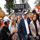 여성,총리,시위,호주,폭력,장관