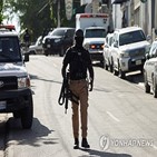아이티,경찰관,갱단,총리,공격